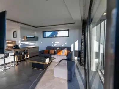 Coin salon dans l'établissement Holiday Home Villa mit Meerblick und privatem Spa - les gîtes de Fabie by Interhome