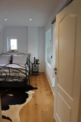 Un ou plusieurs lits dans un hébergement de l'établissement Holiday Home Villa Ty Arvorig by Interhome