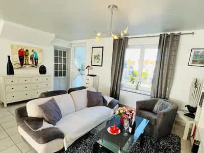 Coin salon dans l'établissement Holiday Home Villa La Plage by Interhome