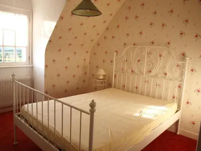 Un ou plusieurs lits dans un hébergement de l'établissement Holiday Home Ker Berhed by Interhome