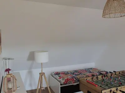 Un ou plusieurs lits dans un hébergement de l'établissement Holiday Home Haus mit Garten und herrlichem Meerblick by Interhome
