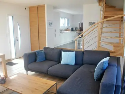 Coin salon dans l'établissement Holiday Home Ein Haus auf der Düne- direkter Zugang zum Strand by Interhome