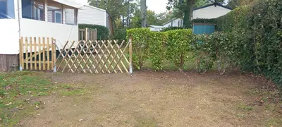 Jardin de l'établissement Mobilhome tout confort domaine de kerlann