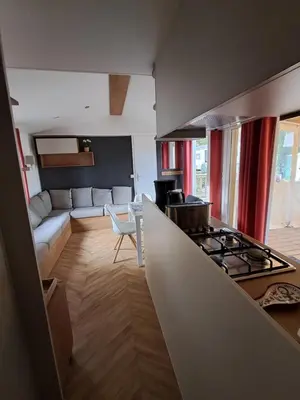 Coin salon dans l'établissement Mobilhome tout confort domaine de kerlann