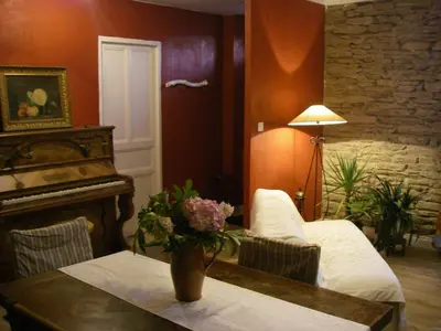Un ou plusieurs lits dans un hébergement de l'établissement Chambre d'hôtes La Maison du Neuilly