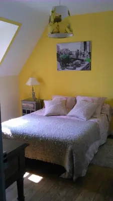 Un ou plusieurs lits dans un hébergement de l'établissement Chambre d'hôtes La Maison du Neuilly