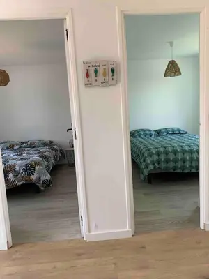 Un ou plusieurs lits dans un hébergement de l'établissement Petite maison de pêcheur pour 4 Personnes au bord de mer
