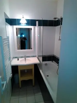 Salle de bains dans l'établissement Appartement Les Sables Blancs
