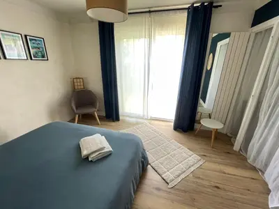 Un ou plusieurs lits dans un hébergement de l'établissement La Chambre Bleue