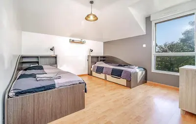 Un ou plusieurs lits dans un hébergement de l'établissement Awesome Home In Lanvéoc