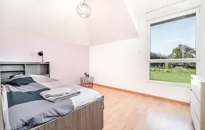 Un ou plusieurs lits dans un hébergement de l'établissement Awesome Home In Lanvéoc