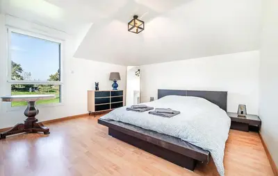 Un ou plusieurs lits dans un hébergement de l'établissement Awesome Home In Lanvéoc
