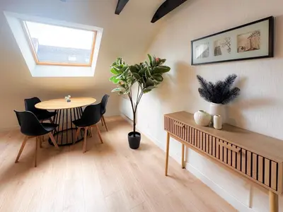 Coin salon dans l'établissement Le Penthouse Quimper Gare & Centre Ville