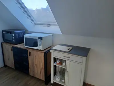 Cuisine ou kitchenette dans l'établissement Appartement quartier calme proche commerces