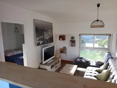 Télévision ou salle de divertissement dans l'établissement Appartement quartier calme proche commerces