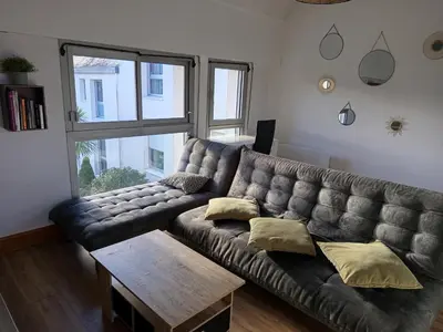 Coin salon dans l'établissement Appartement quartier calme proche commerces
