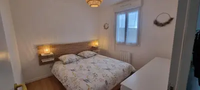 Un ou plusieurs lits dans un hébergement de l'établissement Menez Bleuenn - Jolie Maison proche plages