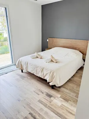 Un ou plusieurs lits dans un hébergement de l'établissement Maison vue mer et plage à pieds