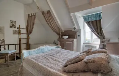 Un ou plusieurs lits dans un hébergement de l'établissement La Petite Chaumière - Charming cottage Pays Bigouden