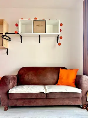 Coin salon dans l'établissement Le Ponant - Appartement 3 chambres cosy et lumineux