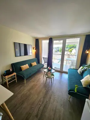 Coin salon dans l'établissement Le cosy des Sables Blancs