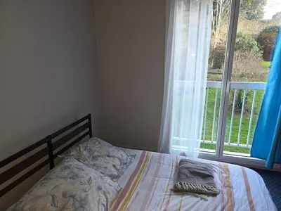 Un ou plusieurs lits dans un hébergement de l'établissement Appartement calme et lumineux au centre ville