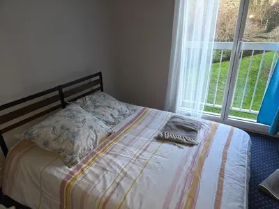 Un ou plusieurs lits dans un hébergement de l'établissement Appartement calme et lumineux au centre ville