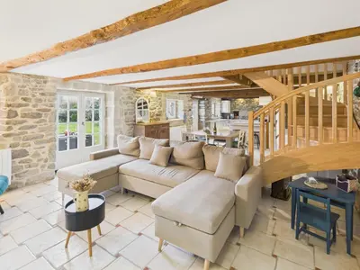Coin salon dans l'établissement Charmante maison pour 6 à 900m de la plage