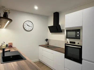 Cuisine ou kitchenette dans l'établissement L'Escale Renanaise