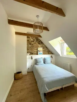 Un ou plusieurs lits dans un hébergement de l'établissement Family Stone House In Pays Bigouden