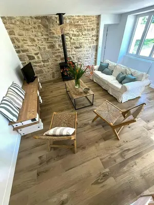 Coin salon dans l'établissement Family Stone House In Pays Bigouden