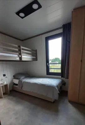 Un ou plusieurs lits dans un hébergement de l'établissement Chalet