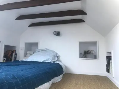 Un ou plusieurs lits dans un hébergement de l'établissement cottage in Logonna