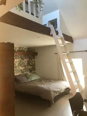 Un ou plusieurs lits dans un hébergement de l'établissement cottage in Logonna