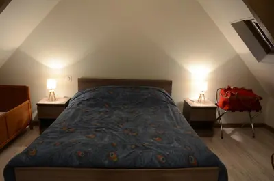 Un ou plusieurs lits dans un hébergement de l'établissement Gîte 5 personnes, possibilité Table d'hôtes le soir
