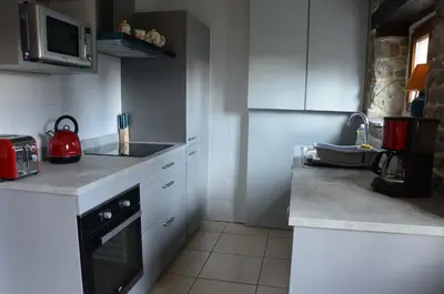 Cuisine ou kitchenette dans l'établissement Gîte 5 personnes, possibilité Table d'hôtes le soir