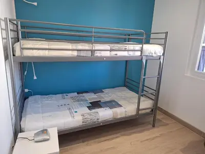 Un ou plusieurs lits dans un hébergement de l'établissement Modern holiday home in St Pol de Leon