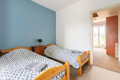 Un ou plusieurs lits dans un hébergement de l'établissement Grande maison à 100 mètres de la plage
