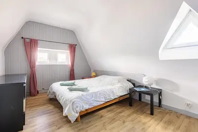 Un ou plusieurs lits dans un hébergement de l'établissement Grande maison à 100 mètres de la plage