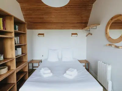 Un ou plusieurs lits dans un hébergement de l'établissement Holiday home with sea view, Le Conquet
