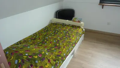 Un ou plusieurs lits dans un hébergement de l'établissement Chez Rosette, 2 chambres