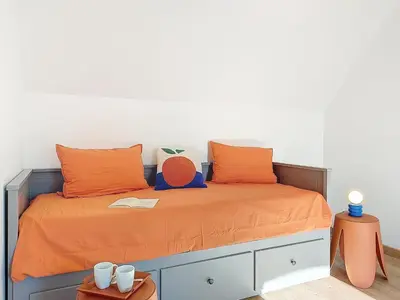 Un ou plusieurs lits dans un hébergement de l'établissement Holiday Home Magdanela by Interhome