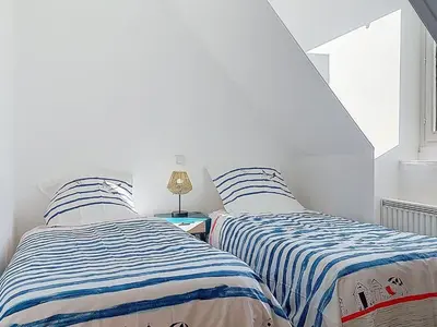 Un ou plusieurs lits dans un hébergement de l'établissement Holiday Home Ty Côte by Interhome