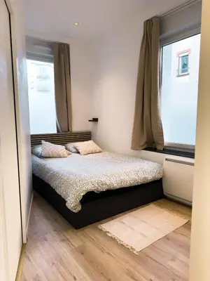 Un ou plusieurs lits dans un hébergement de l'établissement Appartement Brest centre cosy 2