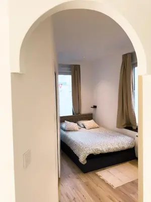 Un ou plusieurs lits dans un hébergement de l'établissement Appartement Brest centre cosy 2