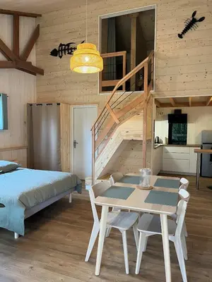 Un ou plusieurs lits dans un hébergement de l'établissement ty loft keremma