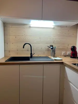 Cuisine ou kitchenette dans l'établissement ty loft keremma
