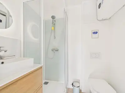 Salle de bains dans l'établissement Plage à 300 m, maison pour 7, jardin et véranda