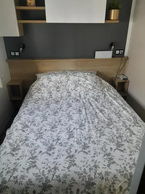 Un ou plusieurs lits dans un hébergement de l'établissement Mobil Home 40 m2 3 chambres