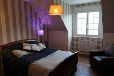 Un ou plusieurs lits dans un hébergement de l'établissement La Maison d'Adonis à la mer